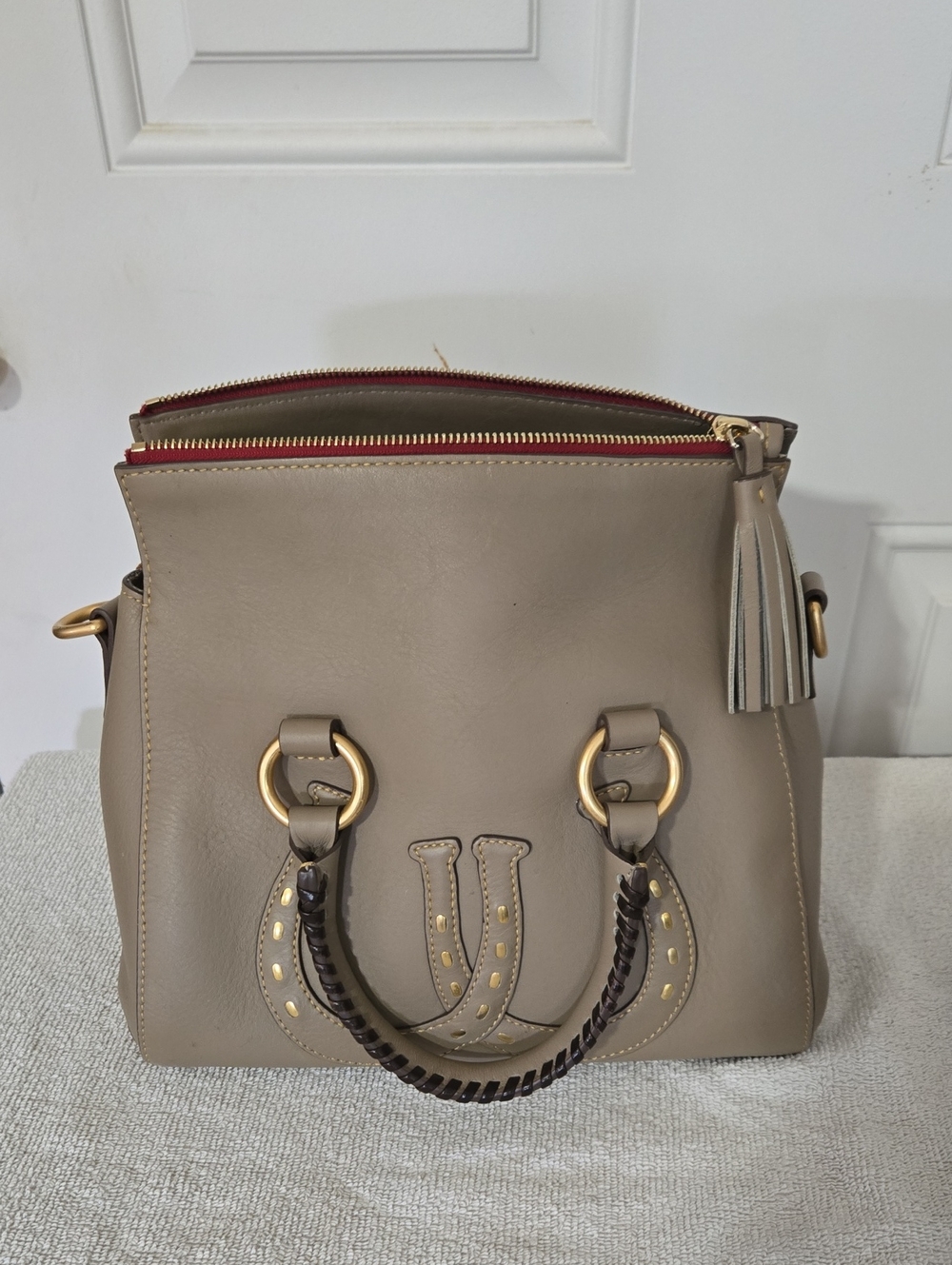 Dooney & Bourke Taupe Leather Satchel with Red Trim and Gold Hardware